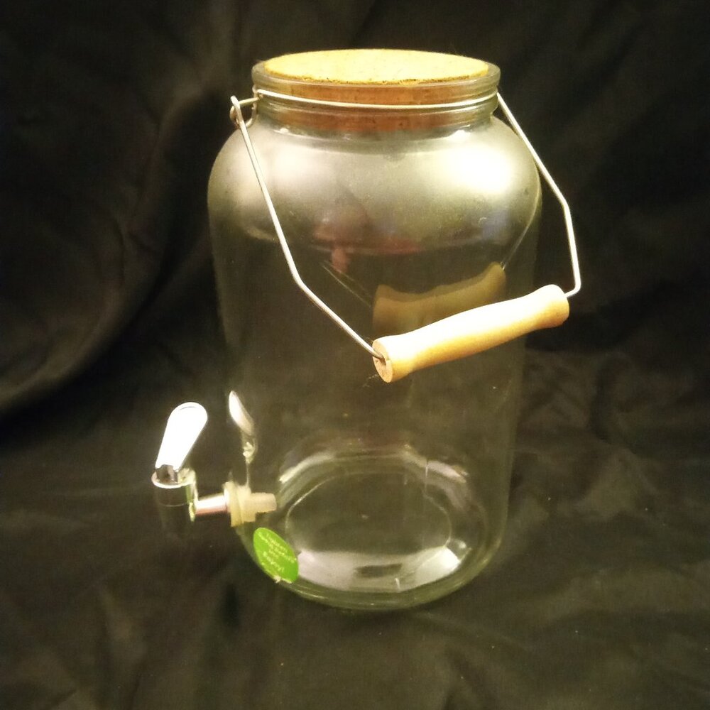 Nice Heavy Glass Beverage dispenser with spout and cork lid